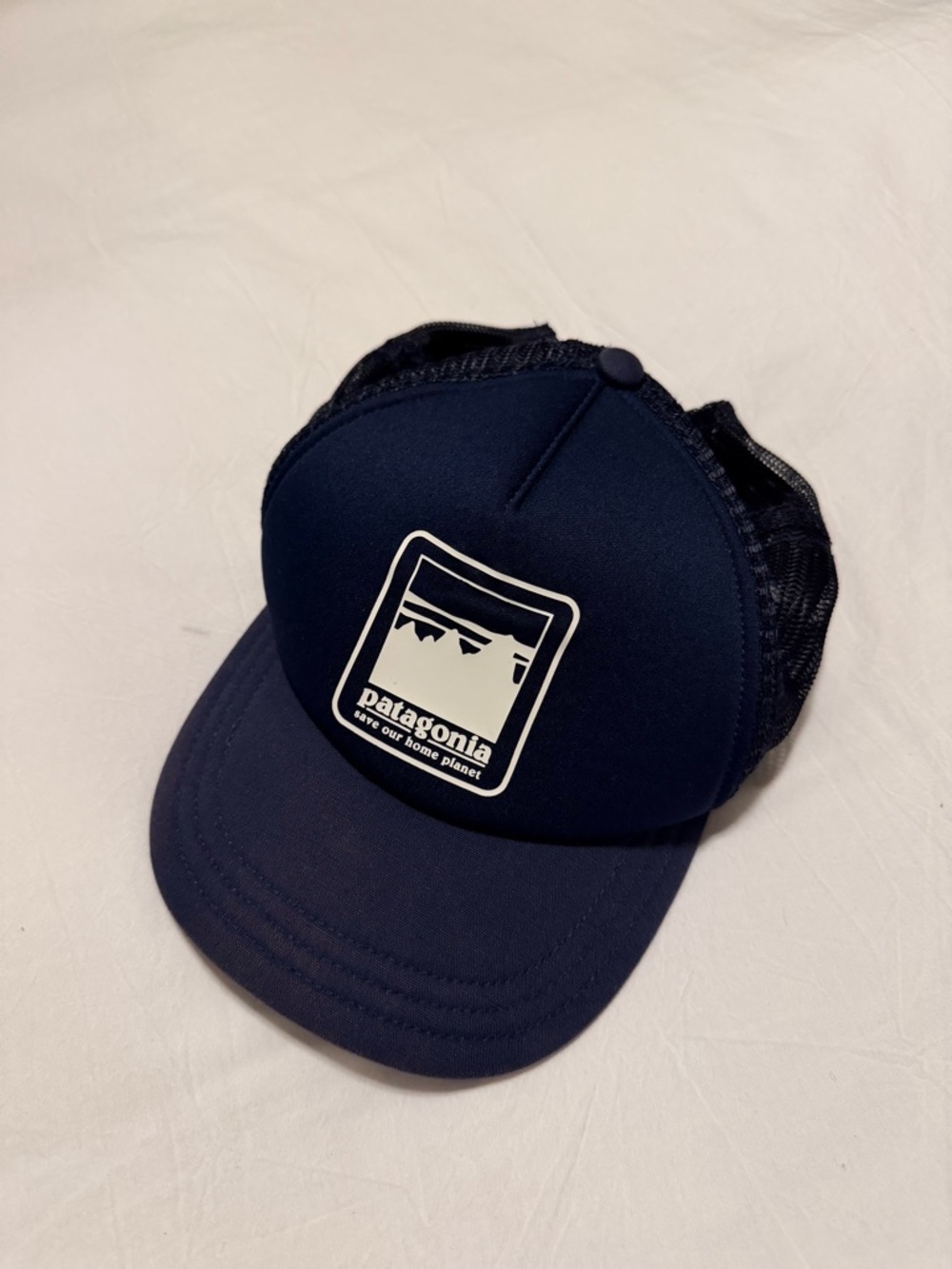Patagonia Navy Hat with White Logo and mesh back